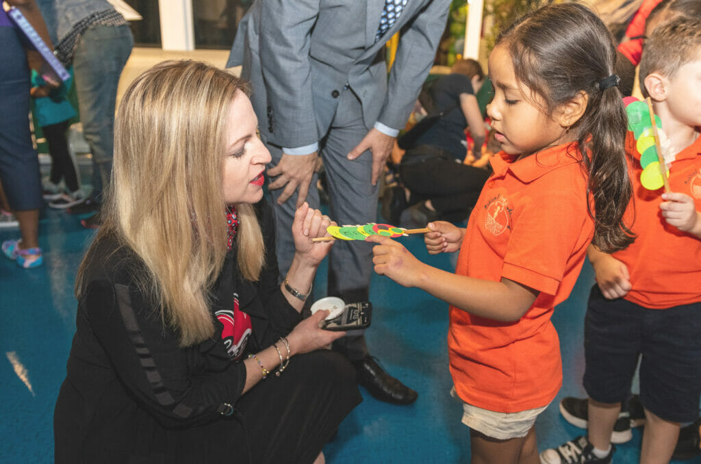 Caitlin Stella, CEO of Joe DiMaggio Children’s Hospital and a student from Oakland Park Academy