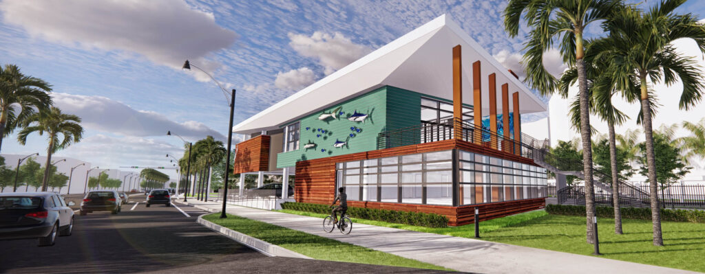 Daytime exterior rendering of the new marine science center at Sullivan Park in Deerfield Beach, a partnership between the Museum of Discovery and Science and the Deerfield Beach Community Redevelopment Agency. The 10,000-square-foot facility will feature hands-on interpretive exhibits themed around “Sawgrass to Seagrass,” exploring the interconnected ecosystems of South Florida.