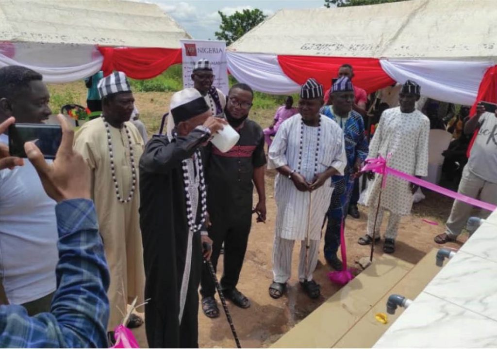 AHF_Community leaders hold a ceremony to officially open the water well