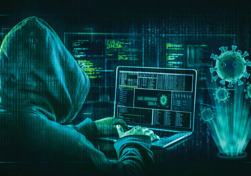 Man working on computer, designing fake website