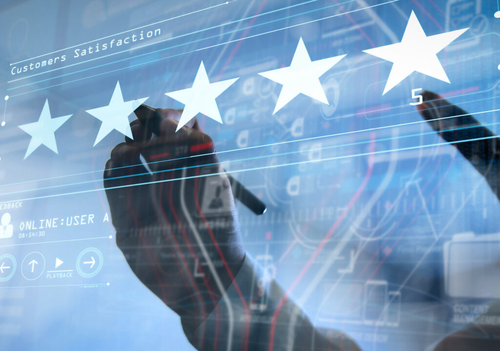 Five stars (5) rating with a businessman is touching virtual computer screen.For positive customer feedback and review with excellent performance.