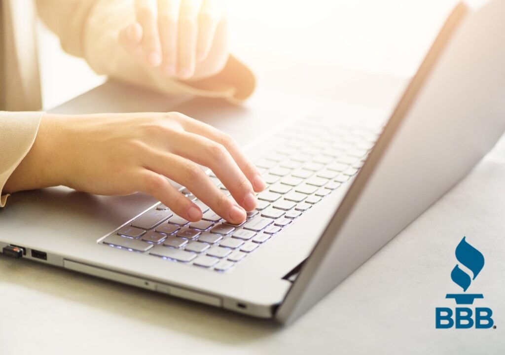 Woman working on computer close up