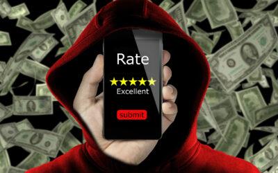 anonymous with hoodie making fake rating and review for money concept conceptual. Untrue feedback in exchange of dollars. Business online ranking is affected from false review by user to gain money.