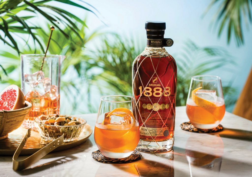 1888 Rum on a table with clasess