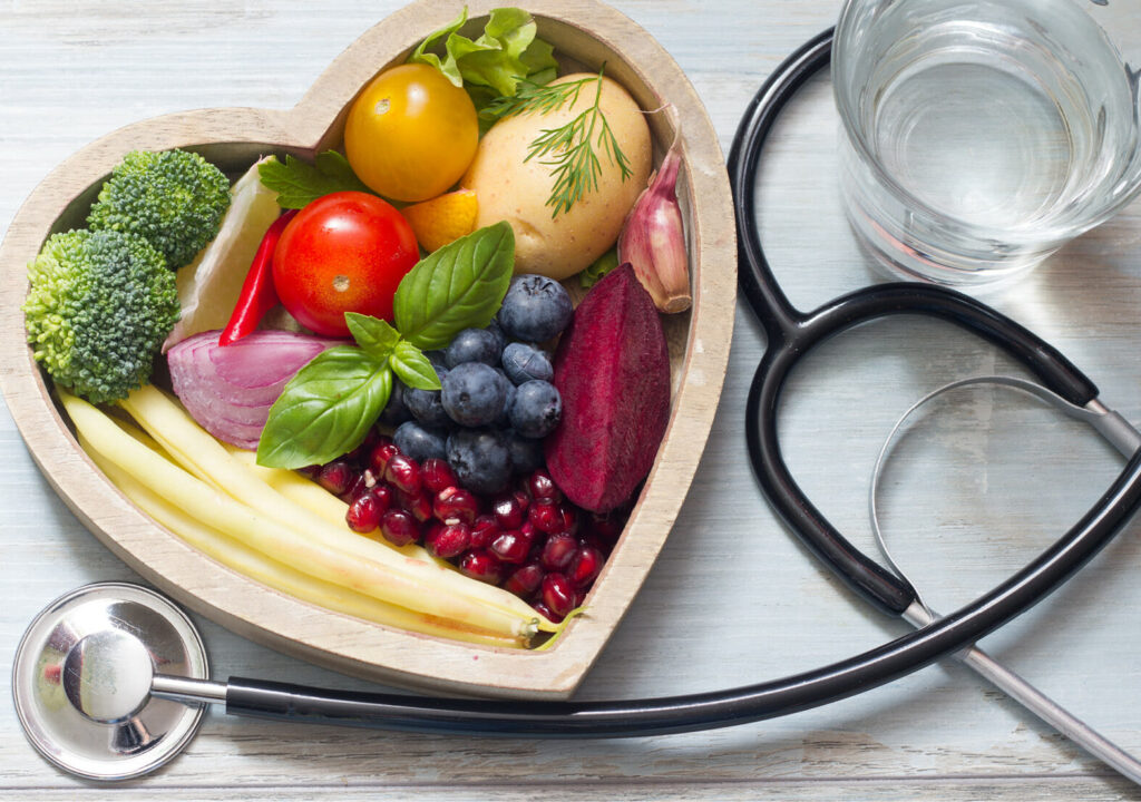 Healthy food in heart diet concept with stethoscope