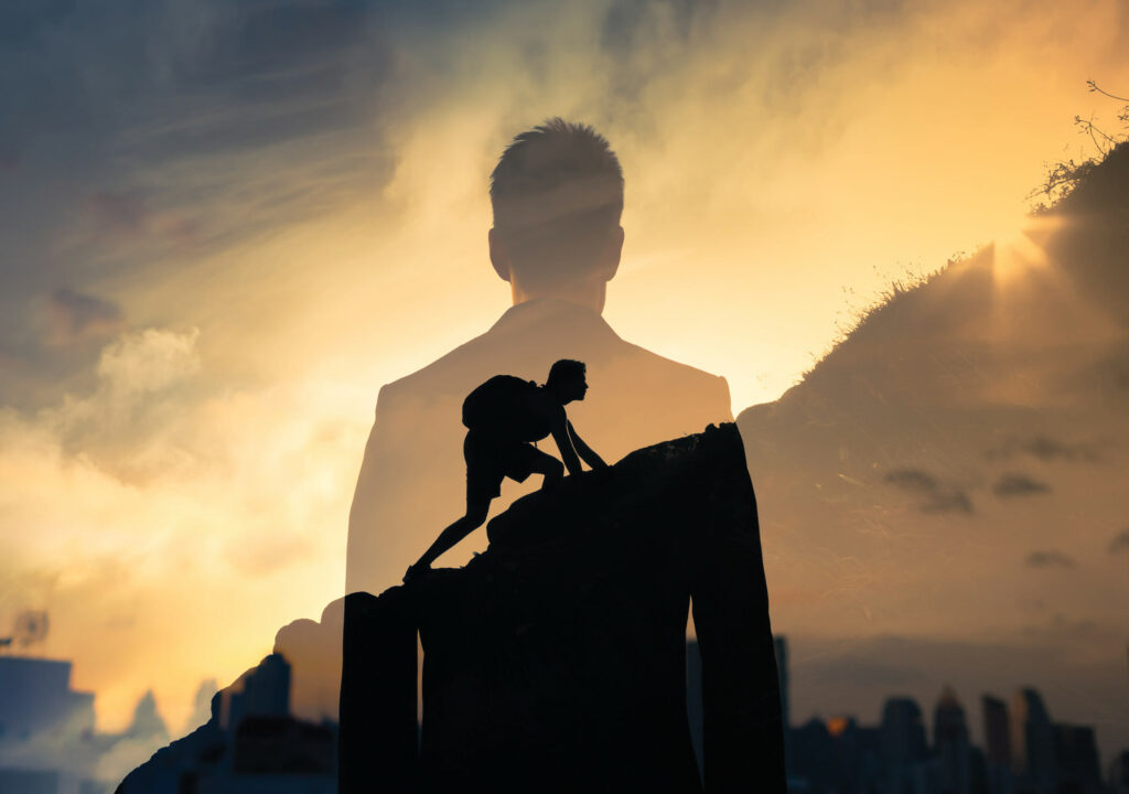 People Never giving up, strength and power. Man feeling determined climbing up a steep mountainside