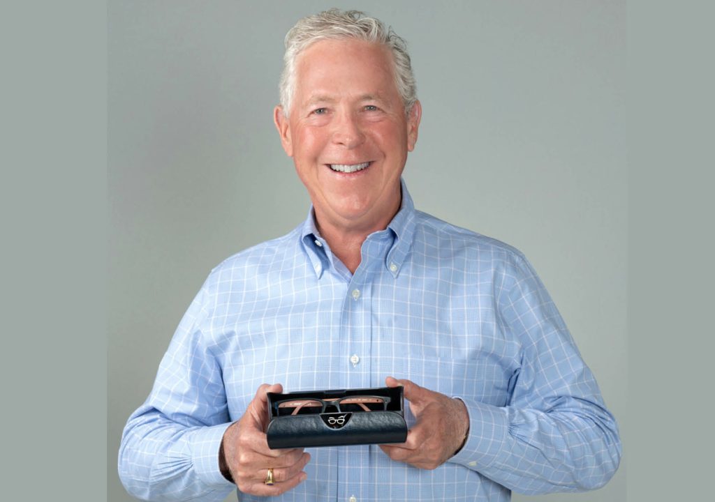 Eye Carry-Photo of Tom Godart holding eye glasses with their case