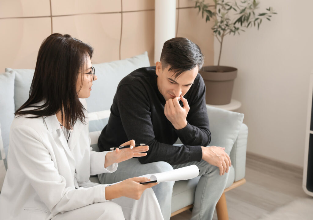 Psychologist working with patient in office