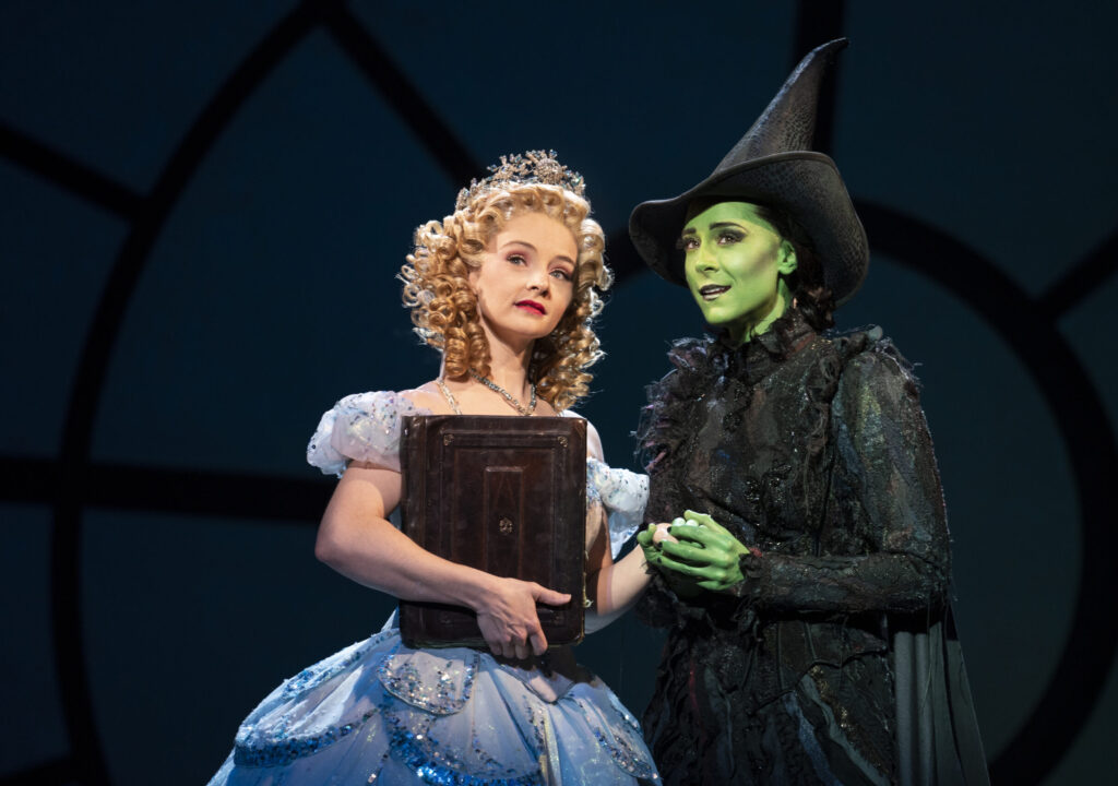 Jennafer Newberry as Glinda and Lissa deGuzman as Elphaba in the National Tour of WICKED, photo by Joan Marcus