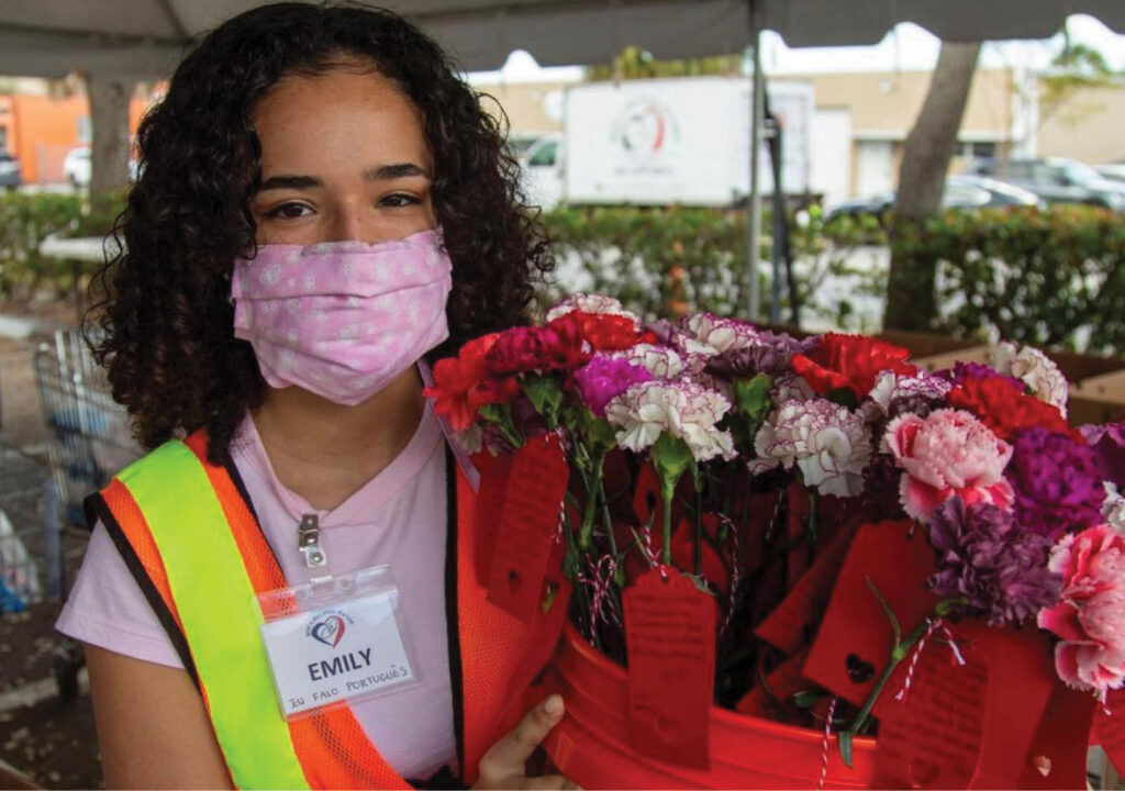 Emily Miranda _ Having flowers in her hand