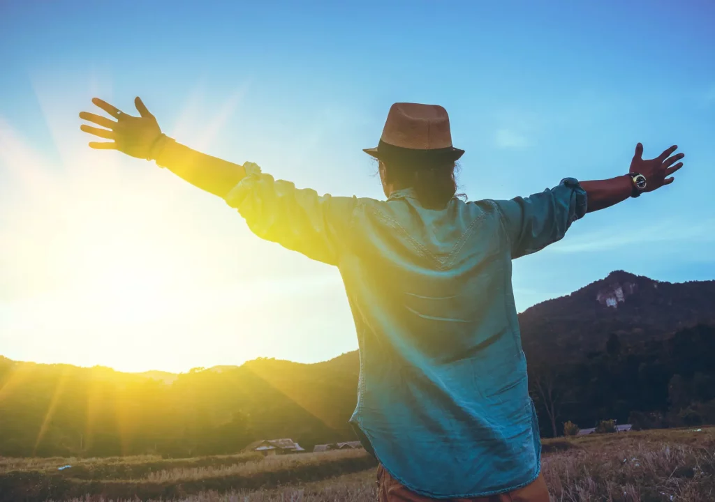 Asian man travel nature. Travel relax. Natural Touch countryside. Lonely man