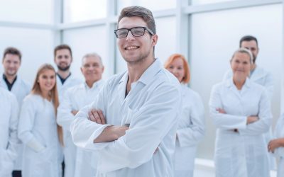 group of confident medical professionals standing together.