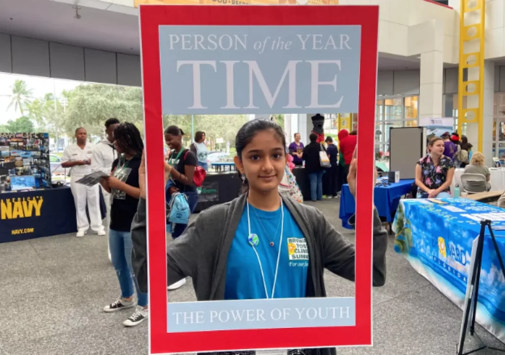 Deerfield Beach High School student, Khushi Desai, held up a Time Person of the Year cover, in honor of climate activist and 2019 person of the year, Greta Thunberg.