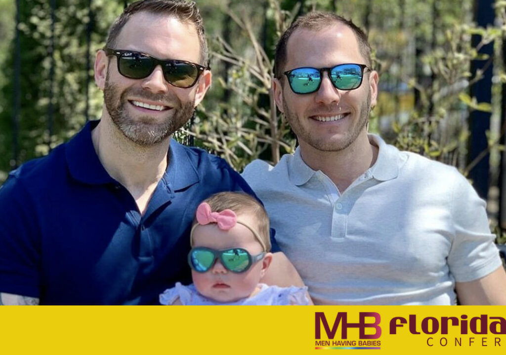 Two men with baby