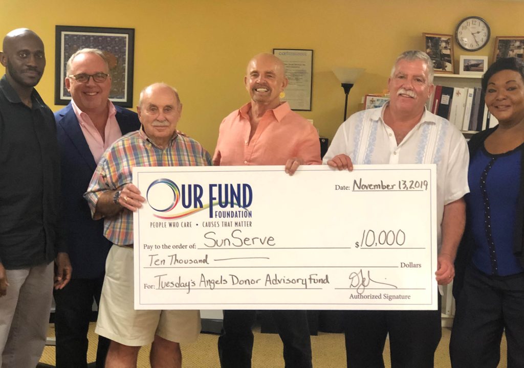 Dexter Green, case manager, Sun Serve; David Jobin, president & CEO, Our Fund Foundation; Don Richard, Tuesday’s Angels; Chuck Nicholls, Tuesday’s Angels Donor Advisory Fund; Mark Ketcham, executive director, SunServe and Tiffany Arieagus, case manager, SunServe   |   Photo Courtesy of Diana Hanford