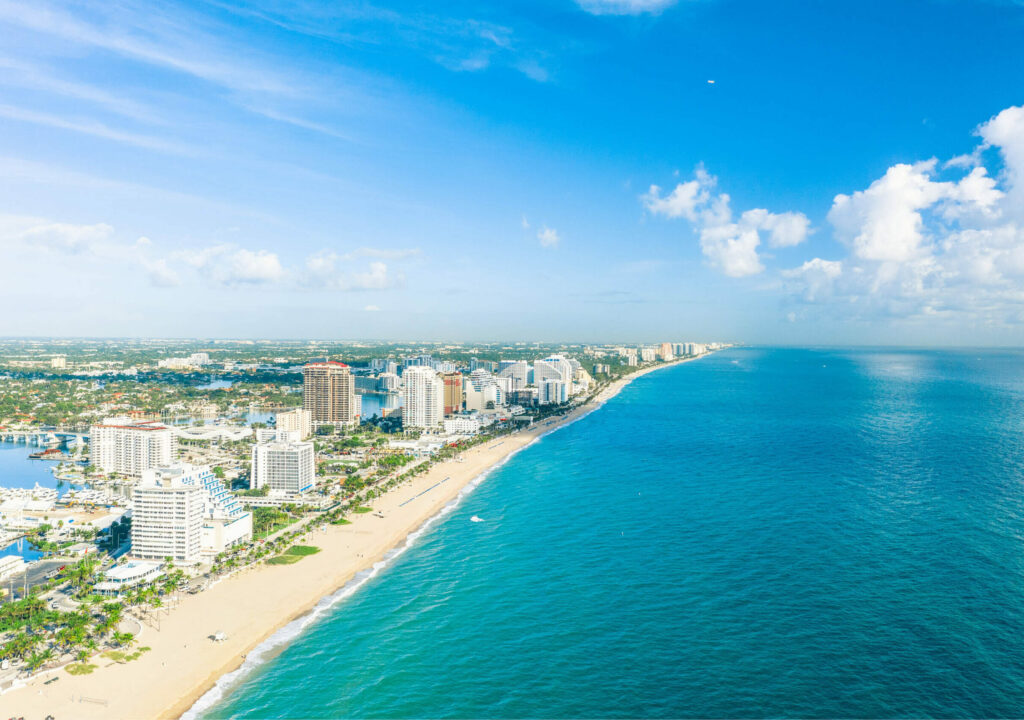 Visit Lauderdale _ Photo of beach and buildings - Sunday Funday-FTL Beach