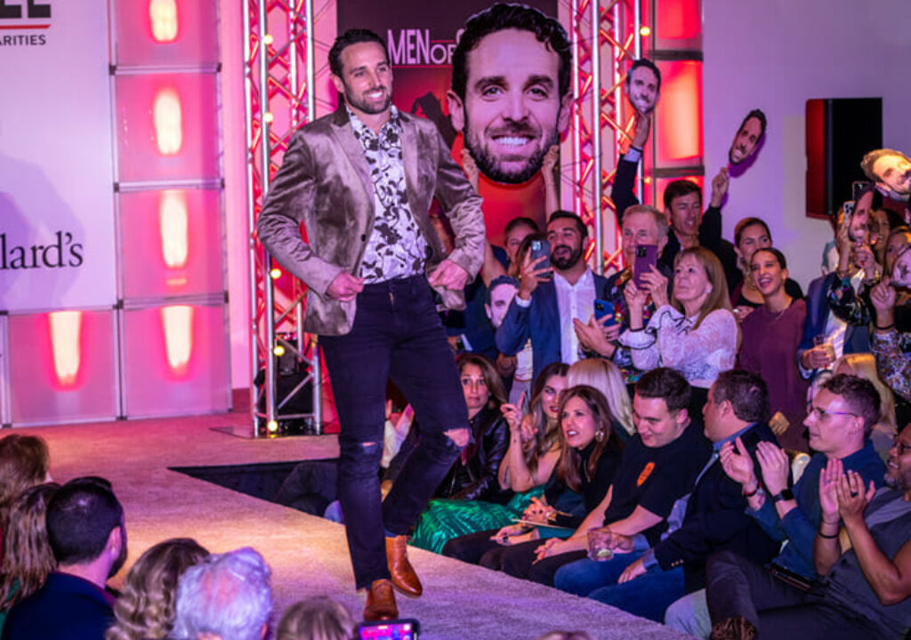 Chris Hawk struts down the runway to applause during the 2022 Galleria Fort Lauderdale’s BBX Capital Men of Style presented by Signature Grand - Photo credit: Michael Murphy Photography